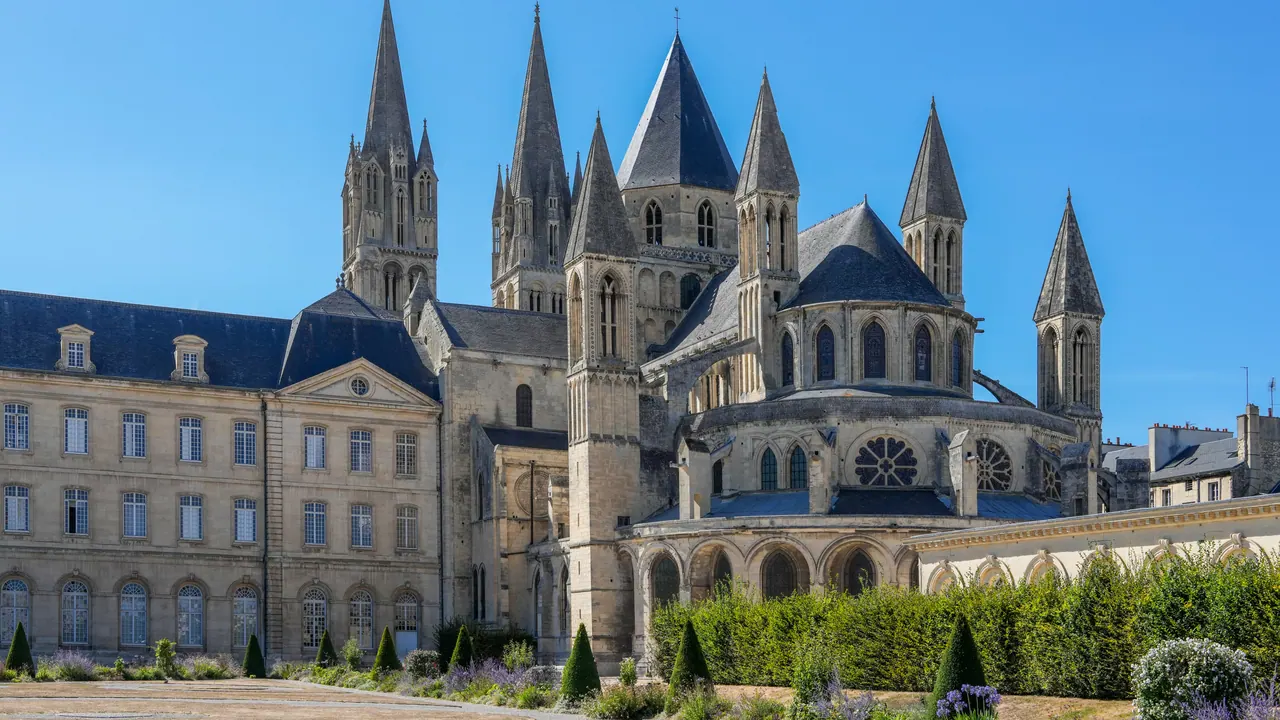 Abbaye aux Hommes in Caen with its church spires behind the town hall