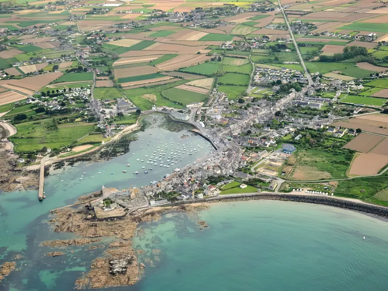 Aerial view of Barfleur harbour and the surrounding Cotentin coastline