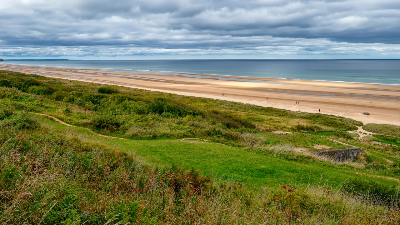 View over Omaha Beach and its grassy bluffs from the German strongpoint WN62