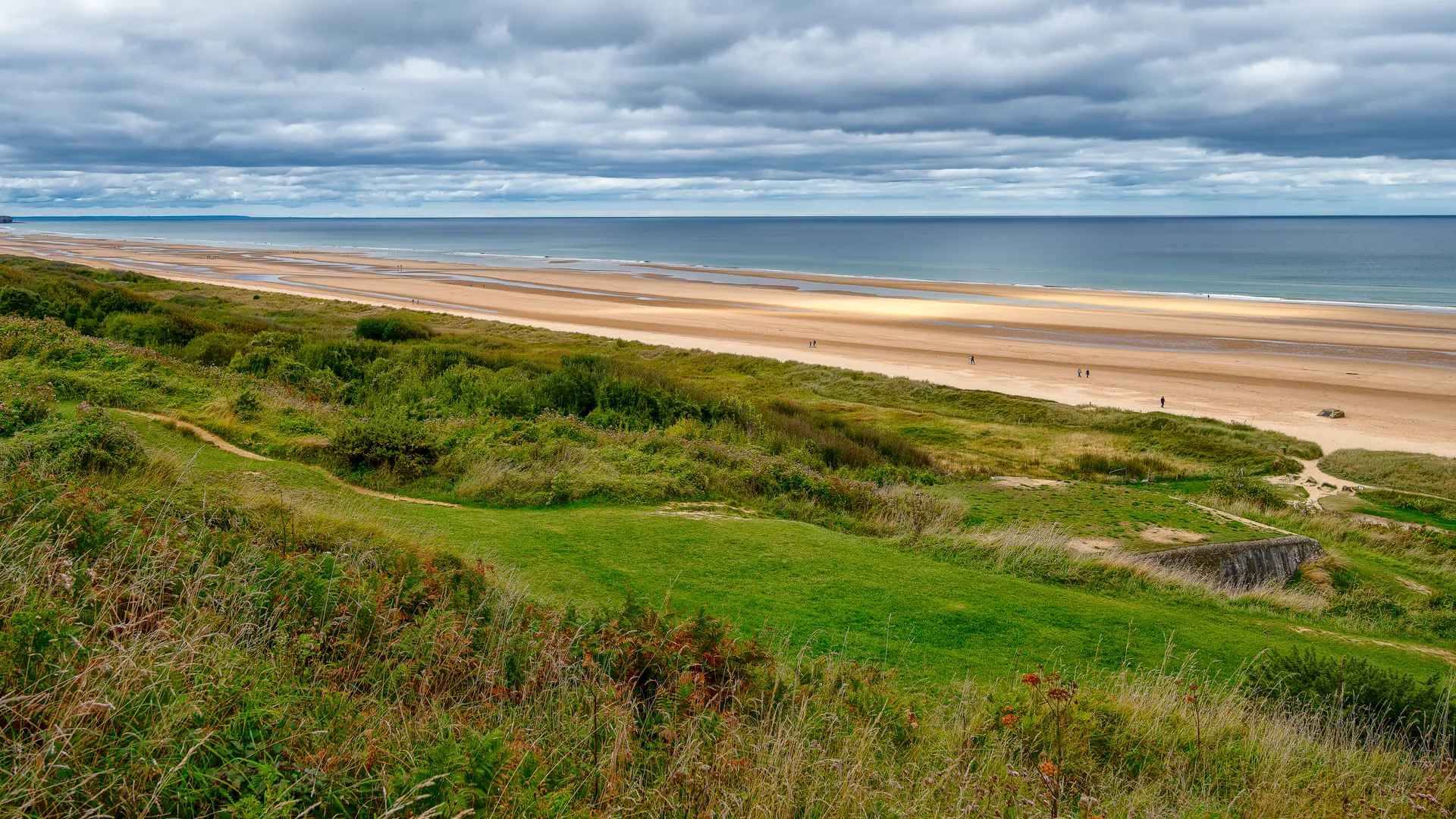 View over Omaha Beach and its grassy bluffs from the German strongpoint WN62